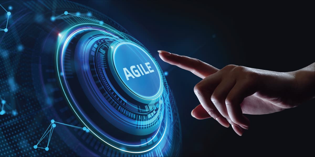 A futuristic digital interface displaying a glowing blue button labeled AGILE.